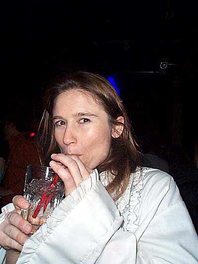 Sally taking a sip: Sally sipping 7-Up